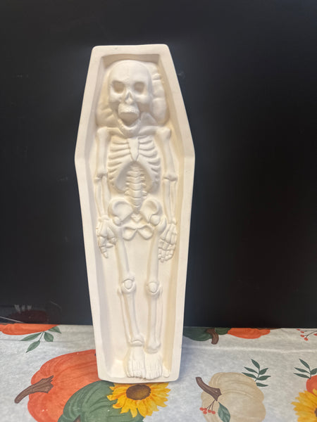 Skeleton In Coffin