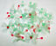 50 Green Holly Poinsettia Christmas Tree lights with Mini Pin Light Centers