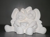 Cuddling Easter Bunny Couple with Honey Pot