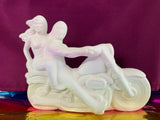 Couple Riding Motorcycle