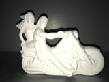 Couple Riding Motorcycle